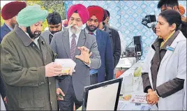  ?? HT PHOTO ?? Punjab chief minister Captain Amarinder Singh with GADVASU vice-chancellor AS Nanda, along with others, during an exhibition organised by the university in Ludhiana on Tuesday.