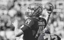  ??  ?? Oklahoma State quarterbac­k Taylor Cornelius engineered the upset of No. 9 West Virginia with 444 total offensive yards. Brian Bahr / Getty Images