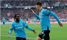  ?? Photograph: Ronald Wittek/EPA ?? Patrik Schick (right) celebrates with Jeremie Frimpong after scoring Leverkusen’s third goal.