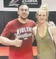  ?? . ?? Geelong striking coach Michael Archer with Holly Holm