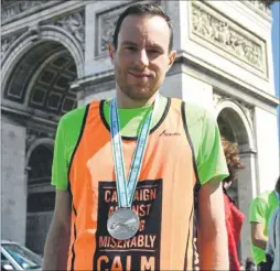  ??  ?? Jon Brenton completed the Paris Marathon and has handed over £3,000 to charity CALM, which supports young men with depression to prevent suicide