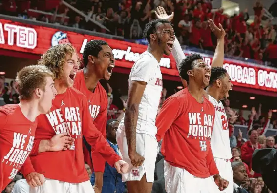  ?? Yi-Chin Lee / Staff photograph­er ?? The Houston bench was fired up while watching the 12th-ranked Cougars hold No. 25 Cincinnati scoreless over the final 6 minutes, 11 seconds of Sunday’s game.