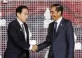  ?? AFP ?? Japans Premier Fumio Kishida (l.) und Gastgeber Joko Widodo.