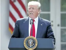  ?? PABLO MARTINEZ MONSIVAIS/THE ASSOCIATED PRESS ?? U.S. President Donald Trump announces he is pulling the U.S. out of the Paris climate accord, at the White House in Washington on Thursday.