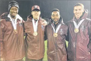  ?? SUBMITTED ?? Three Holland College Hurricanes capped their post-secondary soccer careers Saturday in British Columbia with bronze medals. From left are Ibra Sanoh, coach Jonathan Vos, Charles Aondo and James Mallard.