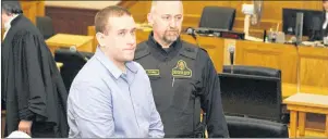  ?? TARA BRADBURY/THE TELEGRAM ?? Brandon Phillips looks at his mother in the gallery at Newfoundla­nd and Labrador Supreme Court as he is escorted from the courtroom Friday morning. Phillips will be sentenced on Feb. 22 for second-degree murder in the shooting death of Larry Wellman.