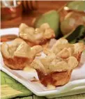  ??  ?? Pear and Brie Honey Tartlets