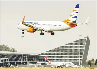  ??  ?? A Boeing 737-800 aircraft from Smartwings lands at Lille Airport in Lesquin on Aug 25. (AFP)
