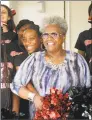  ?? Hearst Connecticu­t Media file photo ?? State Sen. Marilyn Moore, a graduate of Central High School, stands with the school’s cheerleade­rs at the ribbon-cutting ceremony for the newly renovated Central High School in Bridgeport in August 2018.