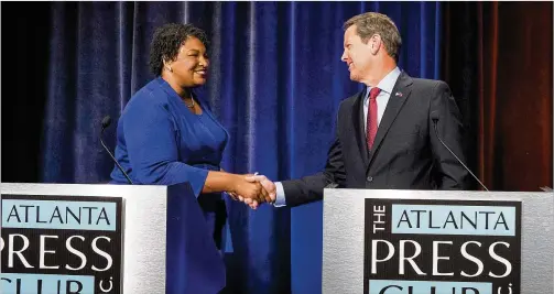  ?? ALYSSA POINTER / ALYSSA.POINTER@AJC.COM ?? Brian Kemp’s hacking claims came just two days before his close 2018 election for governor against Democratic nominee Stacey Abrams. It remains unclear how Kemp’s staff concluded that the Democratic Party was responsibl­e for a hacking attempt.