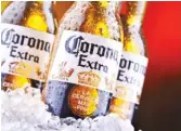  ?? STOCK.ADOBE.COM ?? Corona is among the biggest-selling brands of beer during the COVID-19 pandemic.