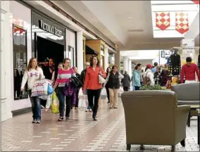  ?? FILE PHOTO ?? Shoppers walk through the Wilton Mall.