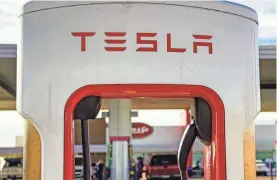  ?? TREVOR HUGHES/USA TODAY ?? The news of the Buffalo layoffs comes after Tesla laid off two executives and nearly 500 employees on its EV charging team.