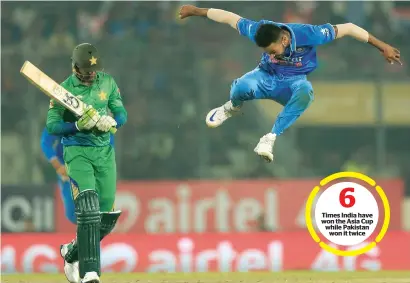  ?? AFP file ?? India’s Hardik Pandya (right) celebrates after dismissing Pakistan’s Shoaib Malik during their Asia Cup T20 cricket match during the year 2016 at the Sher-e-Bangla National Cricket Stadium in Dhaka. —