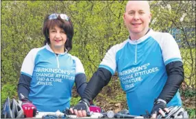  ??  ?? Laura and Chris Endesbury will complete five cycling challenges organised by Parkinson’s UK