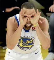  ?? AP ?? Warriors guard Steph Curry has his eyes on another NBA title after his team prevailed in a dramatic opening game to the finals series.
