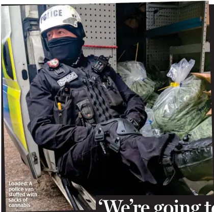  ??  ?? Loaded: A police van stuffed with sacks of cannabis