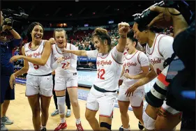  ?? STEVE MARCUS FILE (2022) ?? UNLV guard Alyssa Durazo-frescas, center, celebrates with teammates after a win in the 2022 Mountain West women’s championsh­ip game at the Thomas & Mack Center. Durazo-frescas, now a sophomore, has helped her team win back-to-back conference tournament titles.