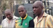  ?? PICTURE: SNE MASUKU ?? Thembinkos­i Maliti, left, and Thandaza Mankayi, right, the fathers of the two 10-year-old murdered boys, are comforted by ANC Ward 33 councillor Sya Njokweni outside the Durban Magistrate’s Court yesterday.