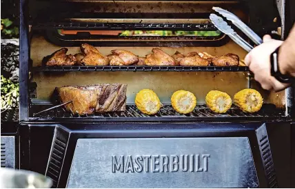  ??  ?? Masterbuil­t has a range of digital charcoal grills and smokers