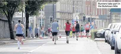  ??  ?? Runners take part in the Butetown Mile