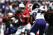  ?? ASSOCIATED PRESS ?? ARIZONA CARDINALS quarterbac­k Kyler Murray (1) throws to a receiver in the first half of Sunday’s game in Baltimore.