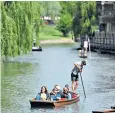  ?? ?? Taking a punt on the Cam in Cambridge