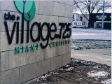  ?? NICK BLIZZARD / STAFF ?? The Villages at 725 on Miamisburg-Centervill­e Road in Miami Twp. has adopted the Miami Crossing District brand into its signage.