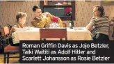  ??  ?? Roman Griffin Davis as Jojo Betzler, Taiki Waititi as Adolf Hitler and Scarlett Johansson as Rosie Betzler