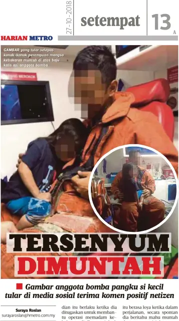  ??  ?? GAMBAR yang tular selepas kanak-kanak perempuan mangsa kebakaran muntah di atas baju kalis api anggota bomba.