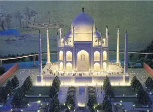  ??  ?? A miniature model of the Taj Mahal in Agra, India.