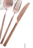  ??  ?? Casa Couture 24-piece copper cutlery set, £180, House of Fraser