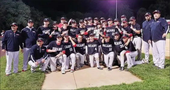  ?? AUSTIN HERTZOG - DIGITAL FIRST MEDIA ?? The Boyertown baseball team poses with the PAC championsh­ip plaque after winning the league title Friday in a 7-0 win over Phoenixvil­le.