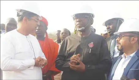  ??  ?? L-R: Group Managing Director, African Industries Group (AIG), Mr. Alok Gupta; Minister of Industry, Trade and Investment, Otunba Adeniyi Adebayo; and CEO of AIG, Mr. Partha Ghosh, when the minister inspected the steel plant being built by AIG in Jere, Kagarko Local Government of Kaduna State...yesterday