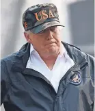  ?? SAUL LOEB/AFP/GETTY IMAGES ?? President Donald Trump views wildfire damage in Paradise, Calif., on Saturday.