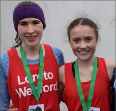  ??  ?? Róisín O’Reilly (Loreto Wexford, left) and Claragh Keane (Presentati­on Wexford, right) after finishing second and first respective­ly in the Intermedia­te girls’ race at the South Leinster cross-country.