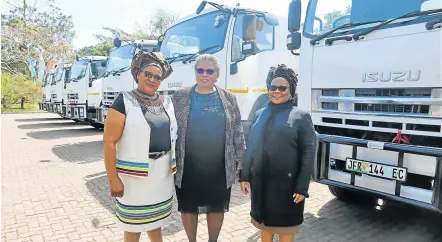  ?? Picture: SIBONGILE NGALWA ?? BRINGING RELIEF: Amathole District Municipali­ty mayor Winnie Nomfusi Nxawe with provincial head of water and sanitation Portia Makhanya and deputy minister of water &amp; sanitation Pam Tshwete at the handover of 10 new water trucks for local municipali­ties in ADM.