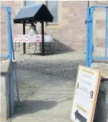  ??  ?? Thinking of others The new foodbank outside the church in Blackford