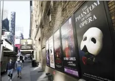  ?? Evan Agostini / Invision file photo via AP ?? Broadway posters are displayed outside the Richard Rodgers Theatre in New York on May 13. Broadway theaters may be dark but there will be plenty of new online production­s of some classic plays this fall. Jeffrey Richards unveiled Wednesday a seven weekly play run of livestream­ed works to benefit The Actors Fund. They will stream on Broadway’s Best Shows and ticket buyers can access the events through TodayTix starting at $5. The plays include “The Best Man,” “This Is Our Youth,” Time Stands Still” and “Race.”