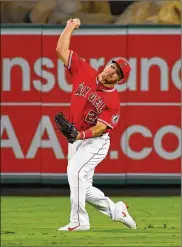  ?? JAYNE KAMIN-ONCEA / GETTY IMAGES ?? Center fielder Mike Trout, the Angels’ two-time American League MVP, has worked on improving his defense and wants to win the Gold Glove, one of the few honors that has eluded the longtime star. “That’s every outfielder’s dream,” Trout says.