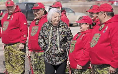  ?? ?? Gov. Gen. Mary Simon speaks with Canadian Rangers on parade for her visit Monday, in Kuujjuaq, Que.