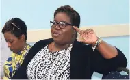 ??  ?? Sophia Johnson, operations manager – recruiting &amp; safety at the Shipping Associatio­n of Jamaica, interacts with the presenter at the Newport West disaster preparedne­ss presentati­on, held at the Shipping Associatio­n of Jamaica’s offices recently.