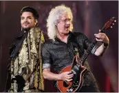  ??  ?? Adam Lambert, left, and Brian May, of Queen