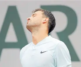  ?? AP ?? Sorpresa. El búlgaro Dimitrov, eliminado por el veterano Verdasco.