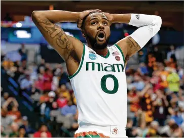  ?? TOM PENNINGTON/GETTY IMAGES ?? Ja’Quan Newton sank a 16-foot fallaway jumper with 39 seconds left to break a 60-60 tie, but it was all heartbreak from there for the Hurricanes, who suffered their second first-round NCAA loss in as many seasons.