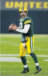  ?? JEFFREY PHELPS/ASSOCIATED PRESS ?? Packers quarterbac­k Aaron Rodgers has 13 touchdown passes and no intercepti­ons through four games.