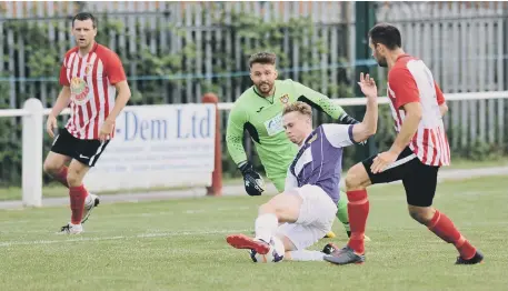  ??  ?? Action from last week’s game between RCA and Ryhope.