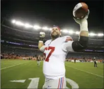  ?? JACK DEMPSEY — THE ASSOCIATED PRESS ?? Giants offensive guard Justin Pugh celebrates after his team’s victory over the Broncos on Sunday.