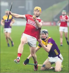  ?? Hatchell) (Pic: George ?? Cork’s Shane Barrett is fouled by Wexford’s Eoin Ryan and Alan Connolly scored from the resultant penalty in the Allianz Hurling League Division 1A tie at Chadwicks Wexford Park.