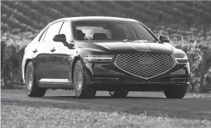  ?? RICHARD RUSSELL PHOTOS ?? The 2020 Genesis G90 is powered by a 5.0-litre, V8 engine that generates up 420 horsepower and 383 lb.-ft. of torque.